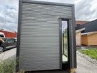 Annekset sett fra kortsiden med inngangsdør.